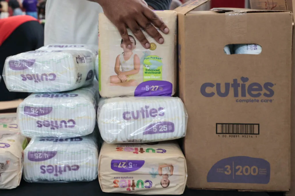An up-close view of stacks of diapers.