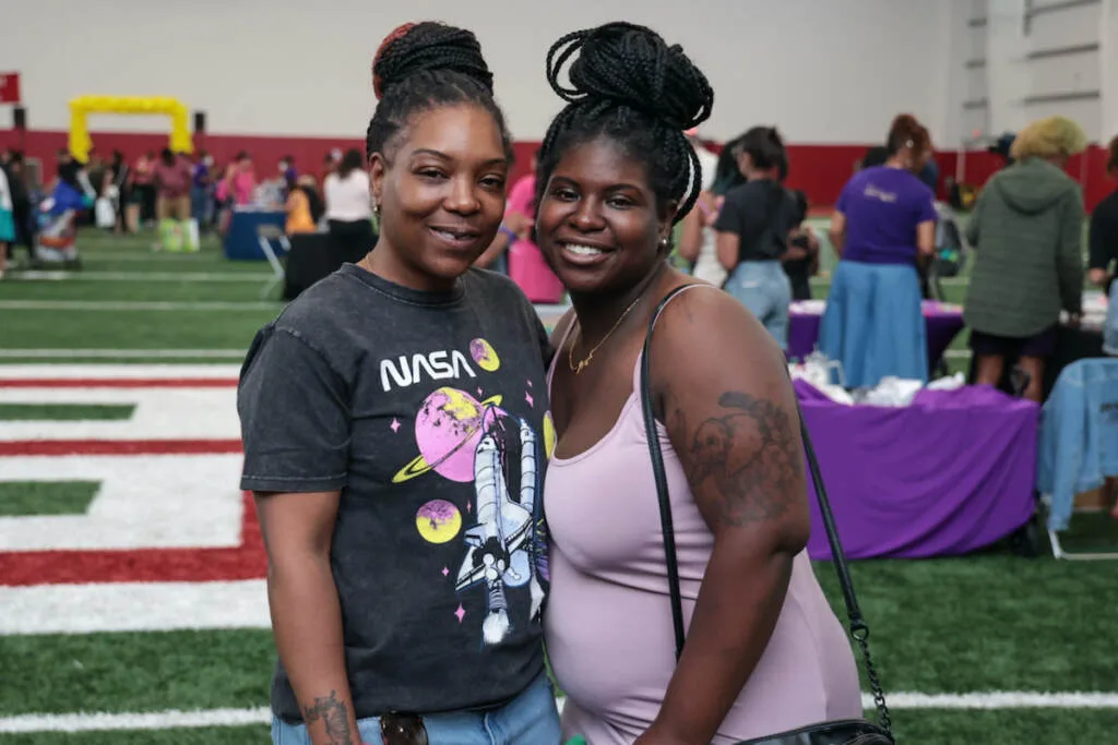 Jasmine Tucker (left) poses for a photo with her expecting daughter Aasiyah Conyers (right)
