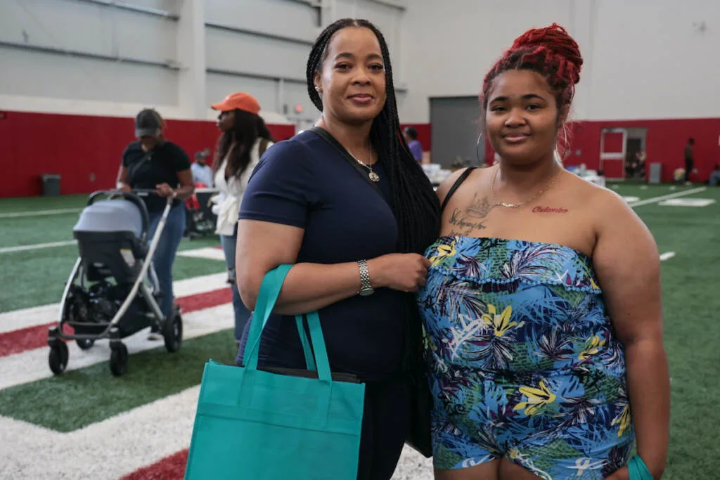 Doula of 2 years, Aveeion Weems (right) and mom Crystal Bodeie (left), attended the community baby shower in Philadelphia