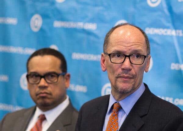 Tom Perez and Keith Ellison in suits.
