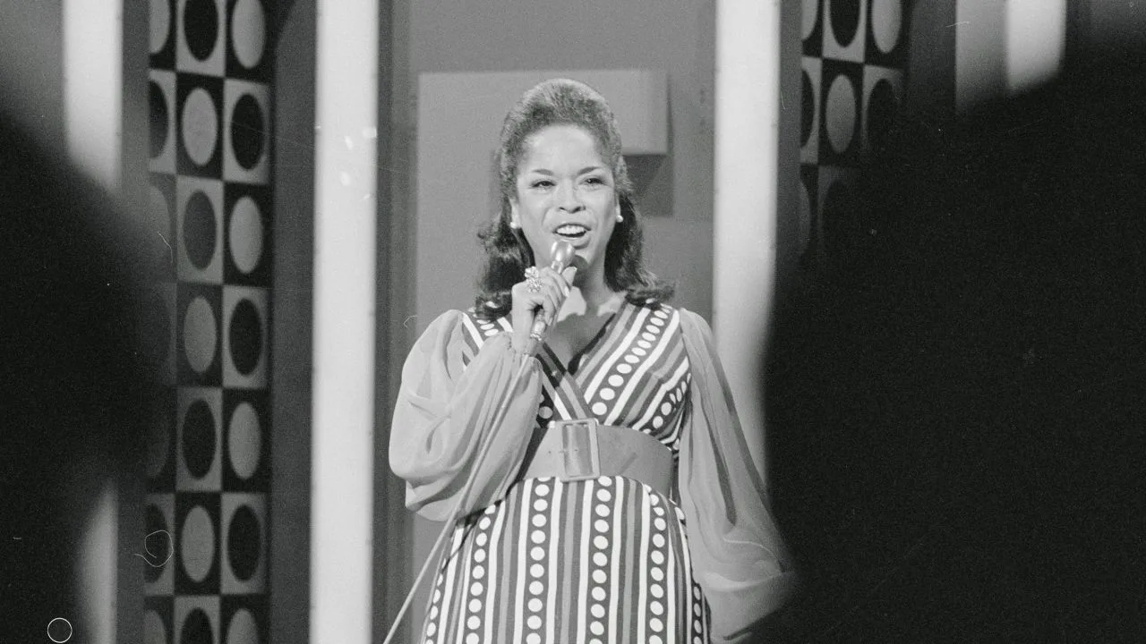 Singer Della Reese shown performing on her TV series, 