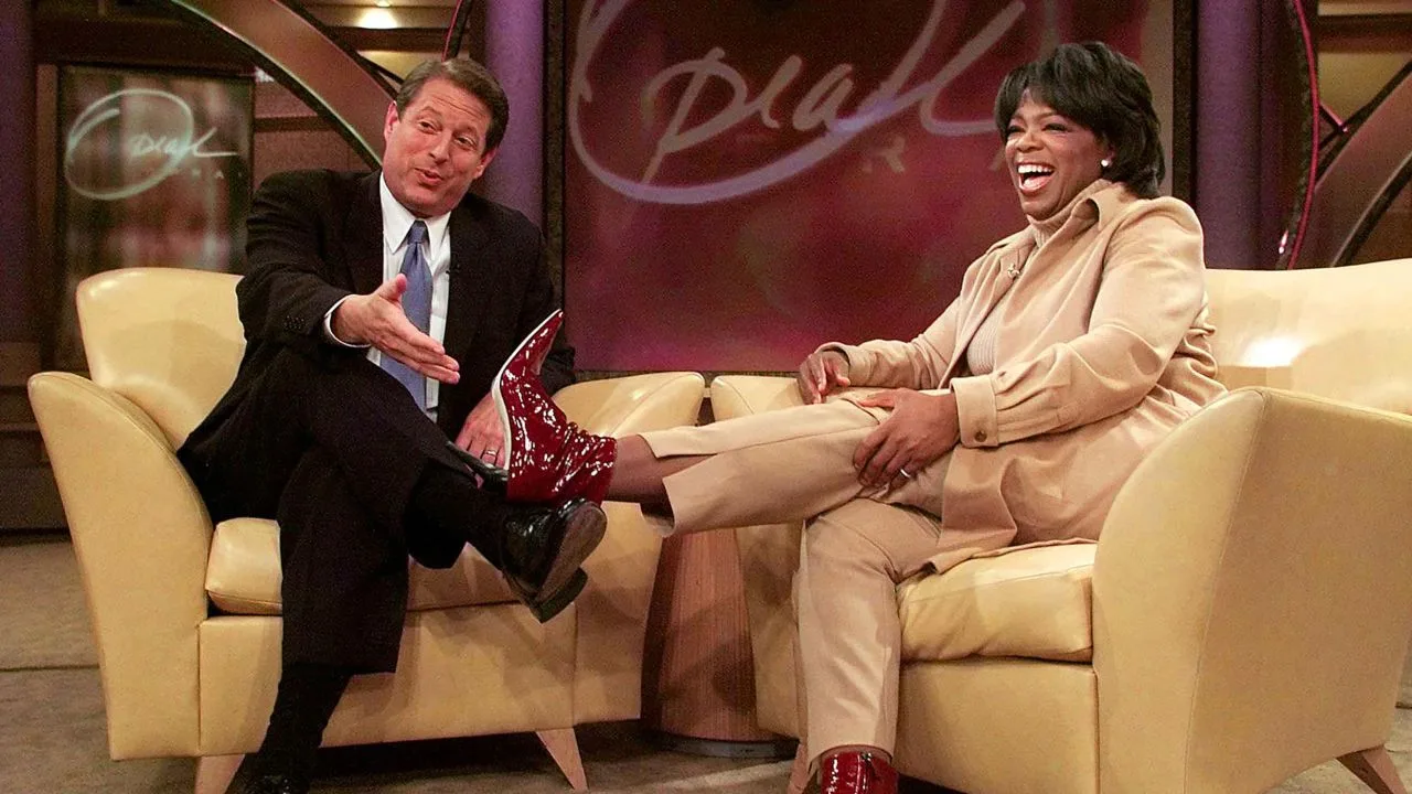 Al Gore talks with Oprah Winfrey on her show in 2000.