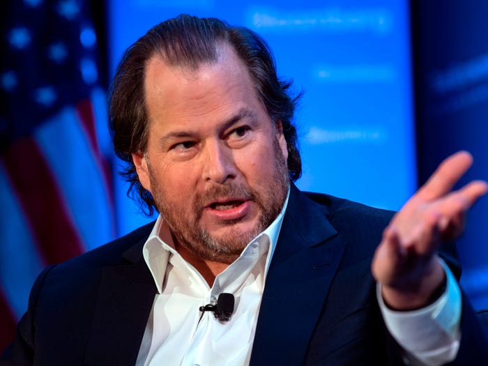 A close-up of Benioff that shows him extending his hand.