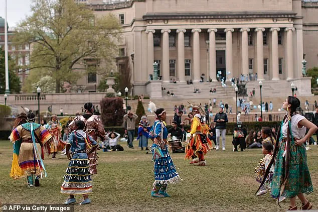 Indigenous people dance as they attend the 11th Annual Columbia University Pow Wow during the Earth Day celebrations in New York in April