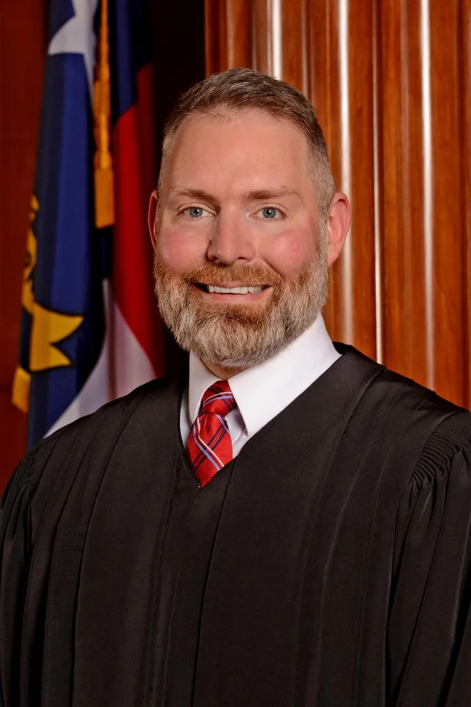 North Carolina Supreme Court Associate Justice Richard Dietz poses in his judicial robe.