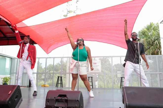 WBTT artists, from left, Raleigh Mosely II, Ariel Blue and Derric Gobourne Jr. perform as “R.A.D.” during WBTT’s inaugural Juneteenth Arts Festival.