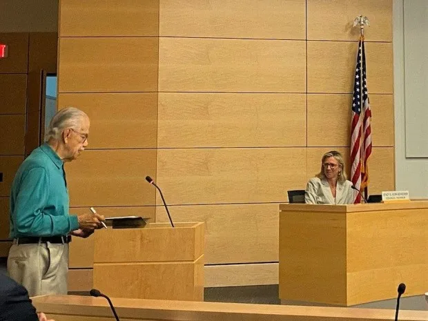 Bobby Braxton, chair of the Truth and Reconciliation Committee, addresses the Williamsburg City Council on July 10. Looking on is council member Stacy Kern-Scheerer. Courtesy of Laura Hill