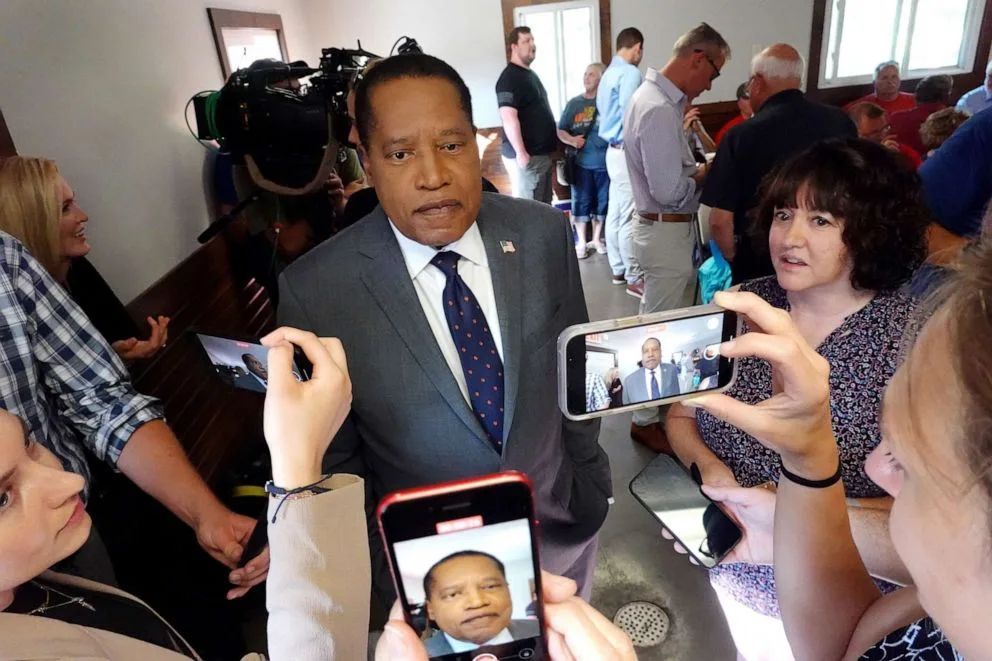 PHOTO: Republican presidential candidate Larry Elder speaks to press during a campaign stop at the Pottawattamie County GOP Executive Council Social Hour on July 06, 2023 in Neola, Iowa.