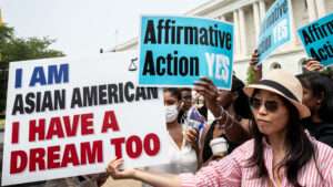 People are seen protesting and celebrating the affirmative action ruling outside the U.S. Supreme Court