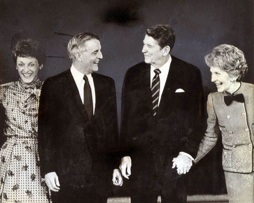 Ronald Reagan and Walter Mondale with their wives at a debate in Louisville, Kentucky, in 1984.