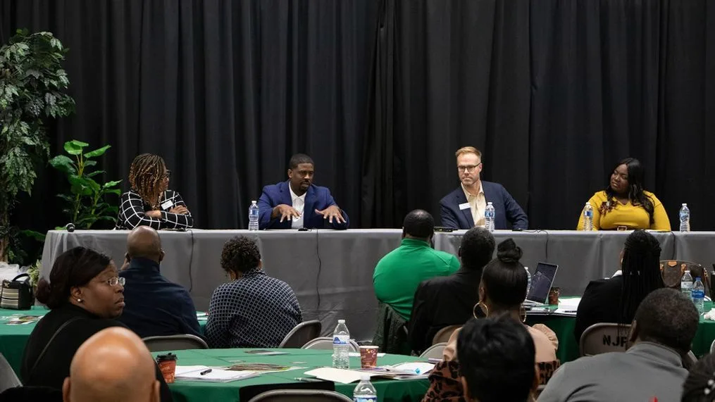 A small business panel during the Flint & Genesee Business Bridge kick-off event in October 2022. (Flint & Genesee Group ){p}{/p}