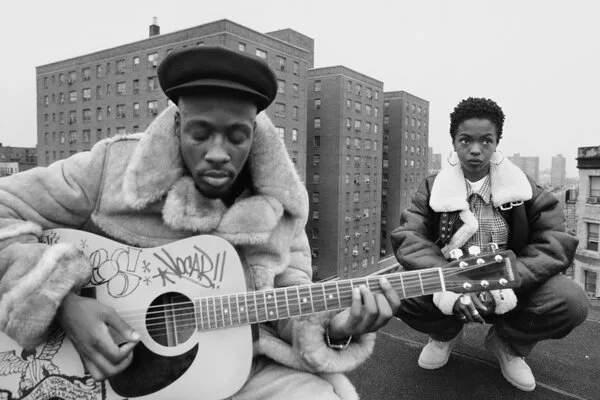 The Fugees on a roof.