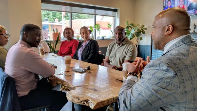 Several Black business owners and advocates meet with Milwaukee County Executive David Crowley on Tuesday as part of his Coffee with Crowley event series at the North Avenue Market, 5900 W. North Ave.