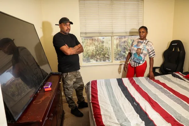 Terry Thomas Jr. and his wife, Tiffaney Turner, show the room where their son was arrested in a raid by the Antioch police and other agencies, during a picture taken on Wednesday, Aug. 23, 2023. A murder case of their son has been dismissed, according to a lawsuit. (Ray Chavez/Bay Area News Group)