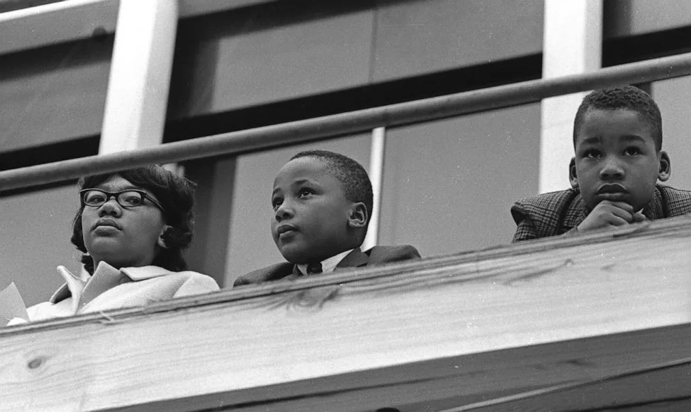 PHOTO: (L-R) Yolanda King, Martin Luther King III and Dexter Scott King, listen to speeches during a rally following the memorial march for their father Dr. Martin Luther King, Jr., April 9, 1968, in Memphis, Tenn.
