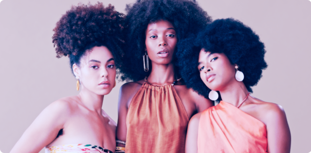 Three beautiful black women with natural hairstyles