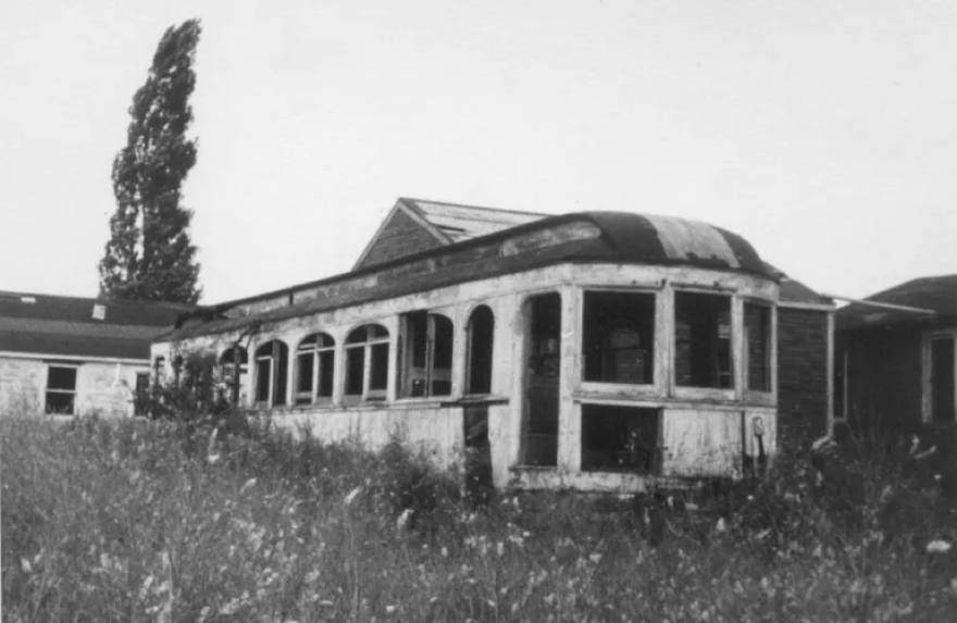 An archival photo of an interurban car repurposed as a cabin at Lorain's On-Erie Beach.