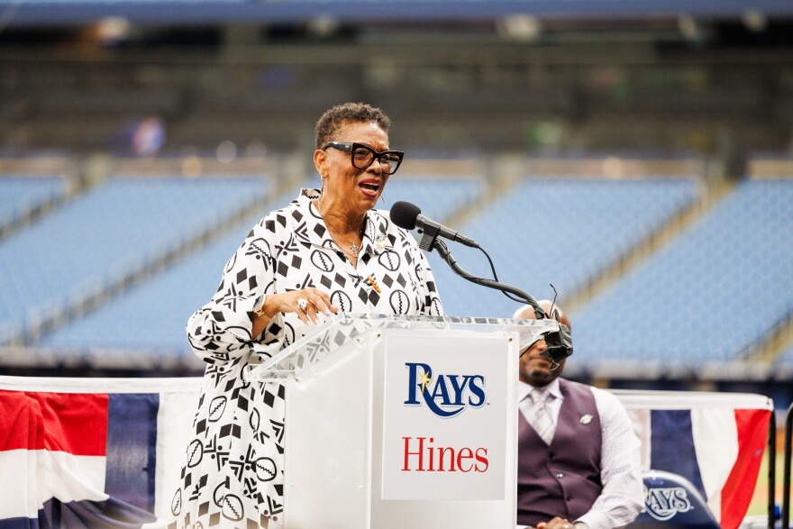 Gwendolyn Reese speaking at a podium