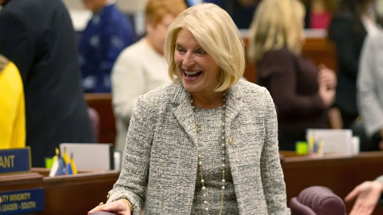 Nevada Republican Assemblywoman Heidi Kasama laughs with lawmakers in Carson City, Nevada, on February 6. 