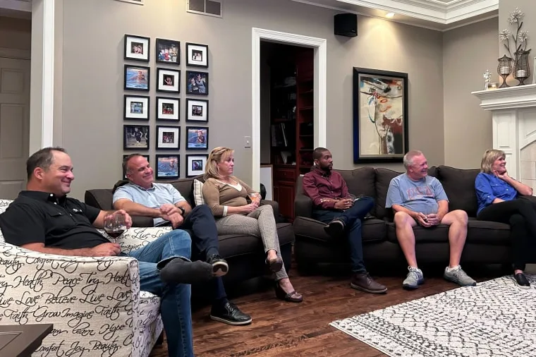 Image: Conservative voters watch the Republican presidential primary debate in Wisconsin on Wednesday night.