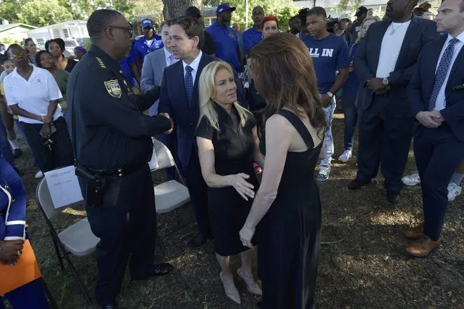 Sheriff T.K. Waters greets Governor Ron DeSantis as Mayor Donna Deegan greets Casey DeSantis as they arrive for the Aug. 27, 2023  prayer vigil for the Dollar General shooting victims.