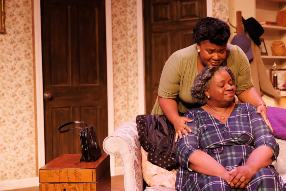 Lorraine Victoria Kanyike as Ruth Younger and Juanita A . Rodrigues as Lena (Mama) Younger in New Rep's production of "A Raisin in the Sun." (Courtesy Ken Yotsukura Photography)