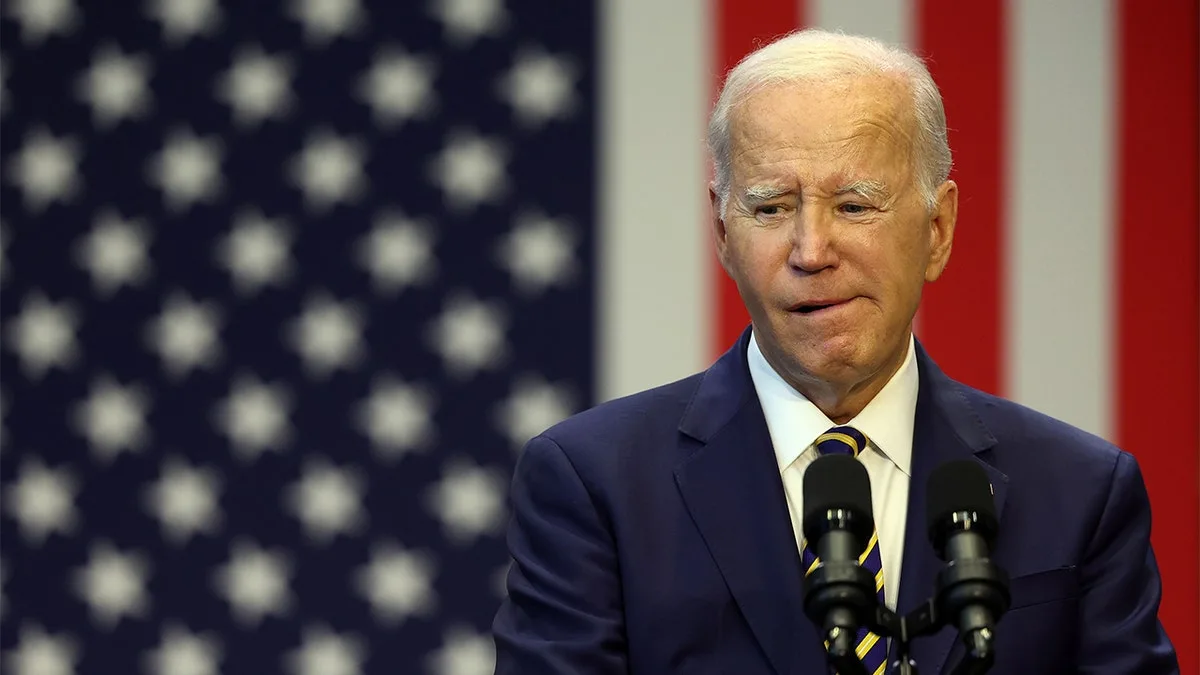 President Biden in front of American flag