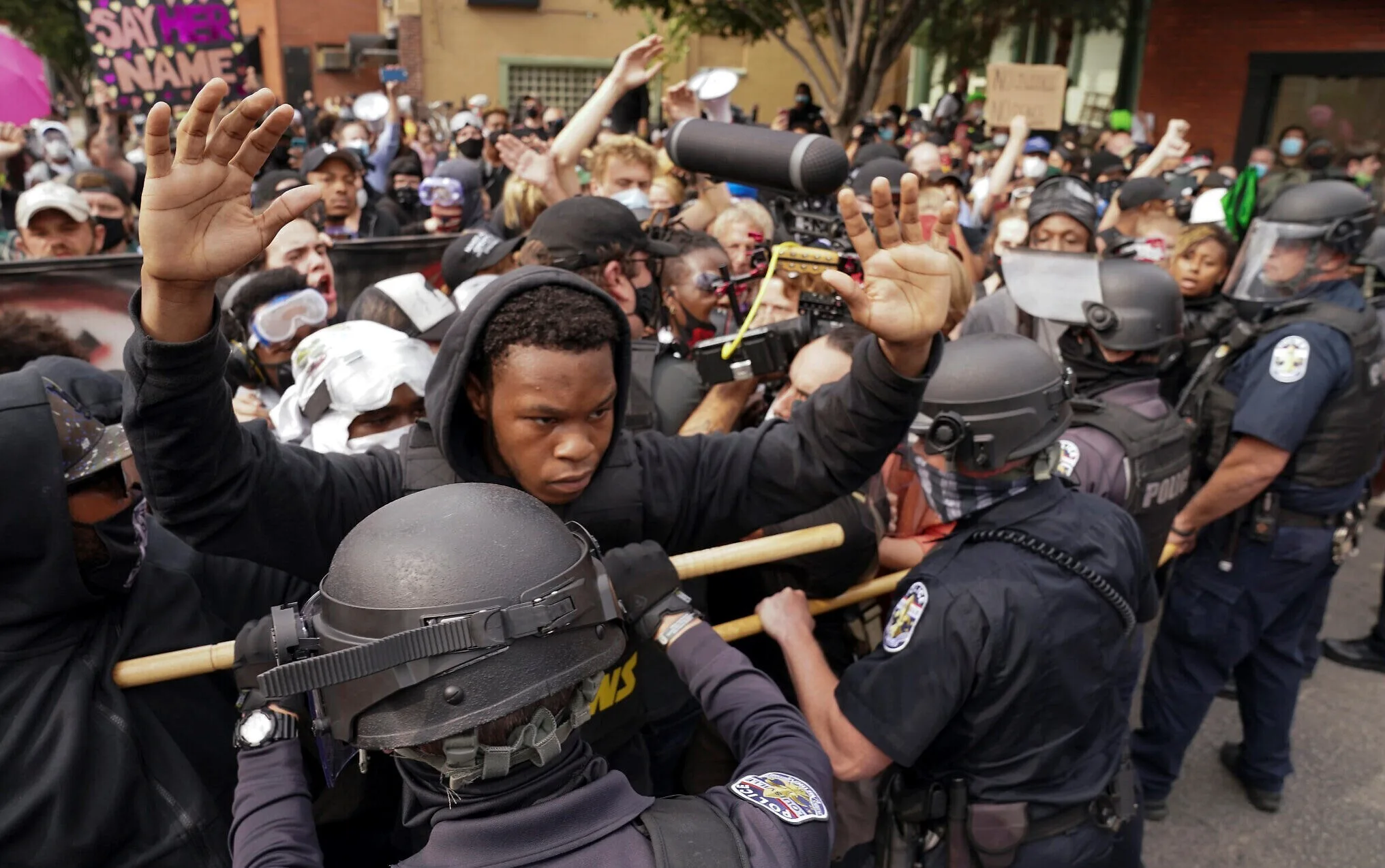 Police and protesters converge during a demonstration on September 23, 2020, in Louisville, Kentucky. (AP)