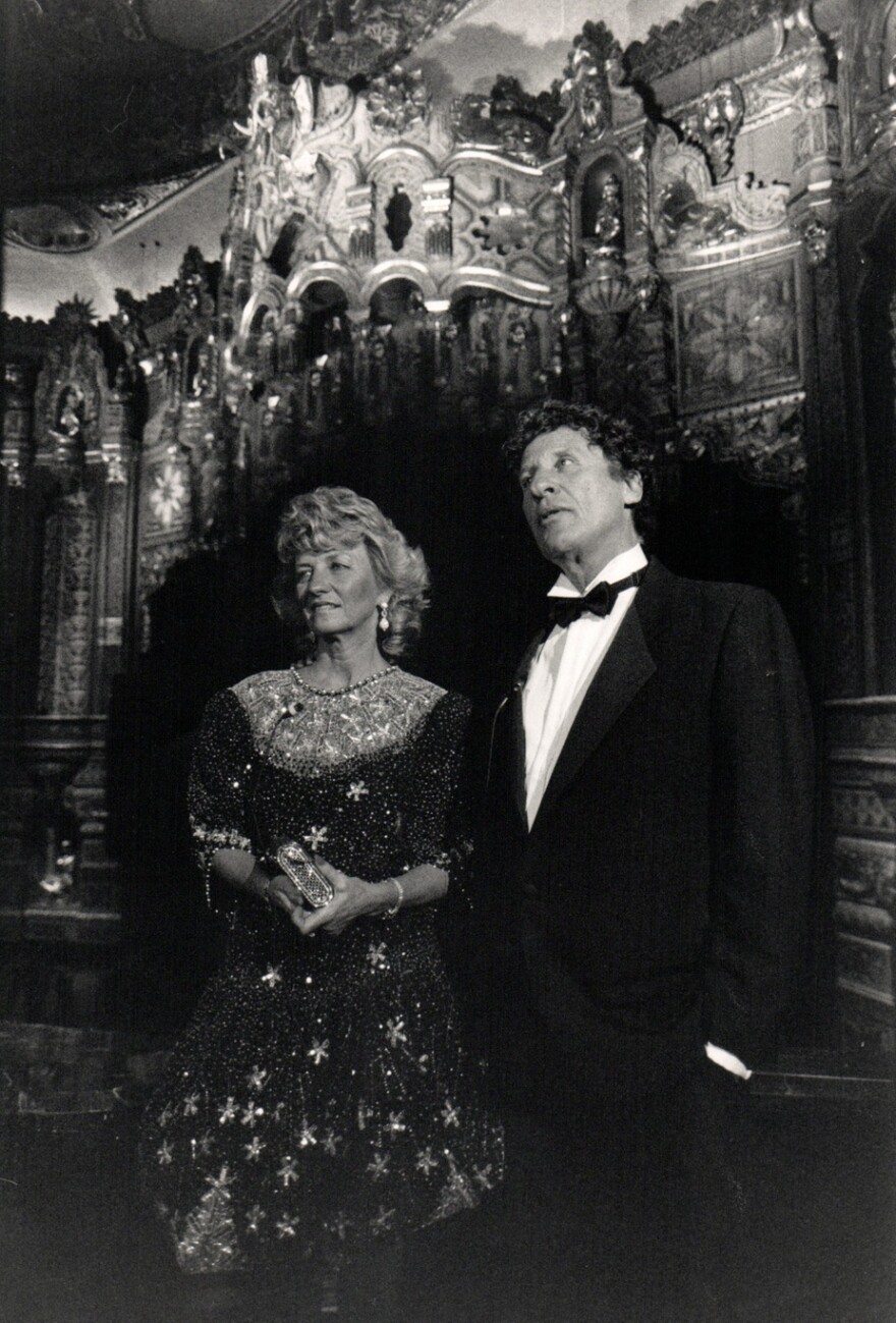 The late Mike Ilitch and his wife, Marian, hold a news conference in the Fox in 1988.