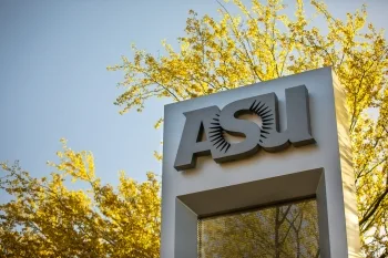 ASU sign surrounded by palo verde blooms.