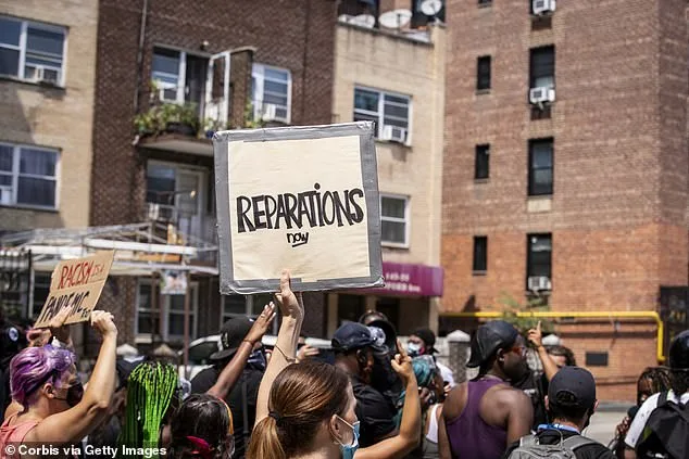 A large crowd of protesters wearing masks and carrying signs that say, 'Reparations Now' as they walk through neighborhoods at the Black Lives Matter protest in Bayside