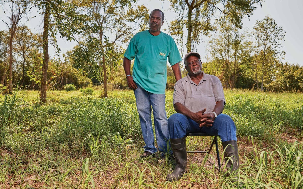 Lawrence (seated) and Brad Smith at the former site of Brooks Chapel Methodist Church, in Millican, on September 27, 2023.