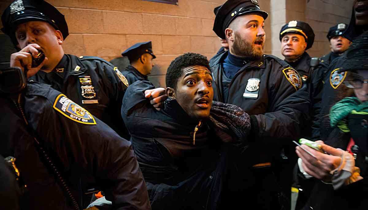 demonstrator getting arrested