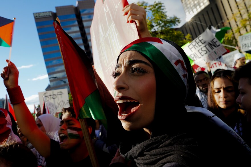 Lamya Abukanan, 23, Ballwin, Mo., participates in a pro-Palestinian rally as tensions and the death toll rise in Israel and the Gaza Strip on Sunday, Oct. 15, at Kiener Plaza in downtown St. Louis.