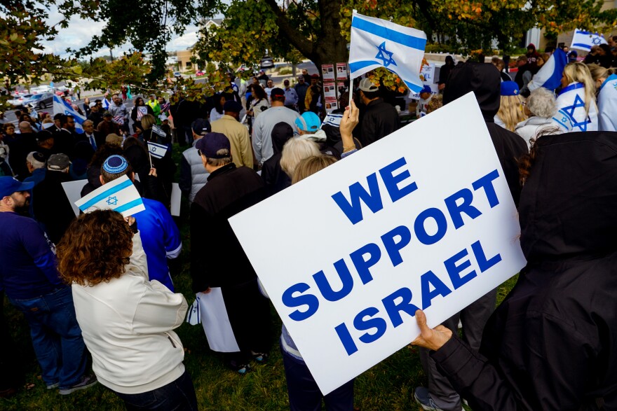 Nearly 200 people gather in support of Israel on Sunday, Oct. 15, 2023, during a rally at the Jewish Federation of St. Louis in Creve Coeur, Mo.