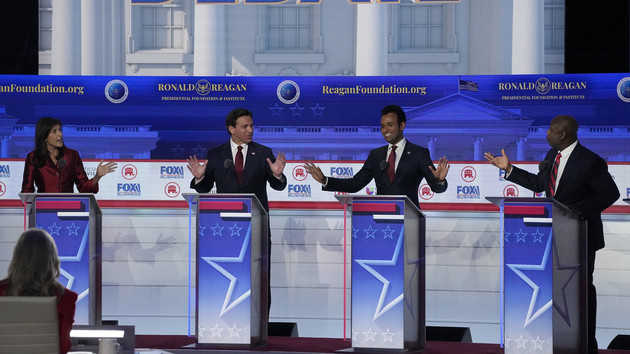 Nikki Haley (left), Ron DeSantis, Vivek Ramaswamy and Sen. Tim Scott (right), argue a point during a Republican presidential primary debate.