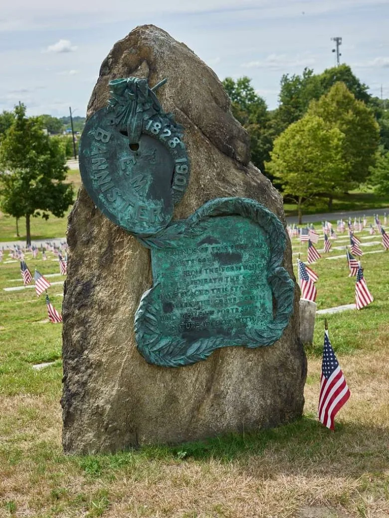 A stone monument cut from a three-metre-tall block of Rhode Island granite at in a cemetery.