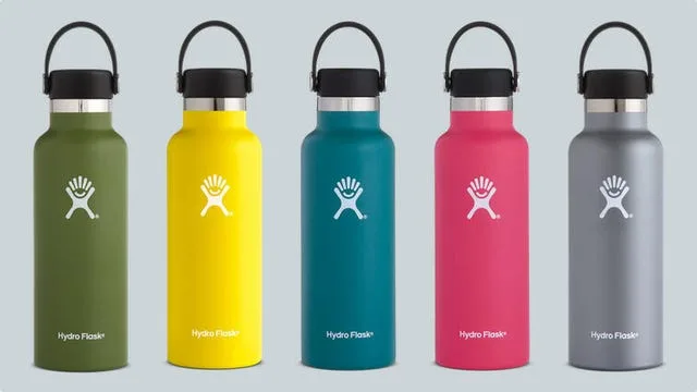 Five different colored Hydroflask water bottles.