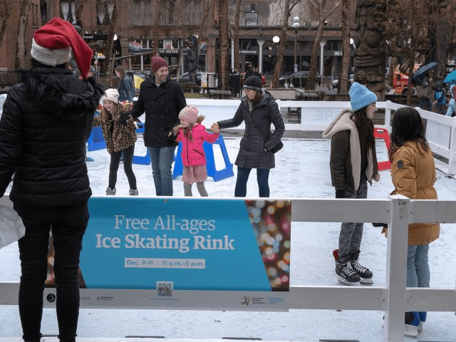 Families enjoy the free all-ages ice skating rink at Occidental Park, Pioneer Square