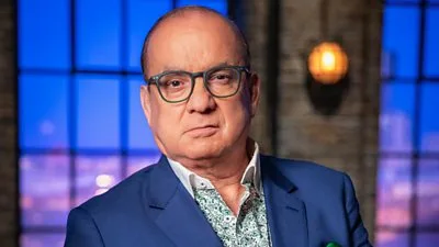 Head and shoulders image of Touker Suleyman pictured inside the Den. 