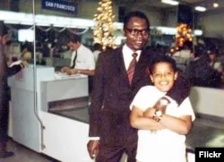 Young Barack Obama with his father