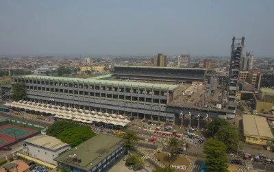 A long structure facing a plaza.