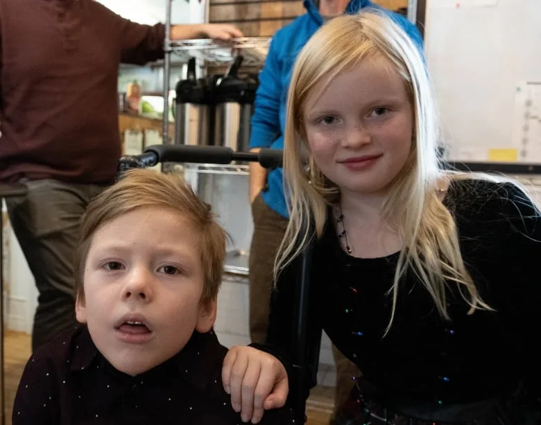 Evelyne Fouchard and her younger brother Caleb in their parent's Black Walnut Bakery