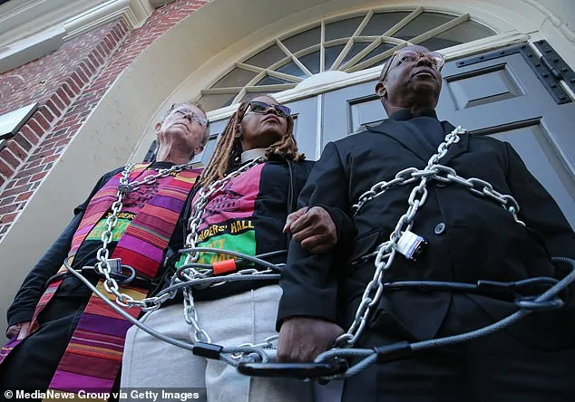 Rev Peterson, right, made headlines with his push to rename Faneuil Hall, a popular tourist site that is named after a wealthy merchant who owned and traded slaves