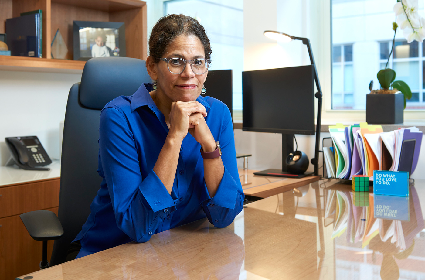 elizabeth howell sitting at her desk