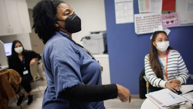 Cherri Harris, clinic manager of the BLOOM: Black Baby Equity Clinic, works with her colleagues in the office on Friday, Jan. 19, 2024, at UCSF Benioff Children's Hospital's Claremont Clinic in Oakland, Calif. (Dai Sugano/Bay Area News Group)