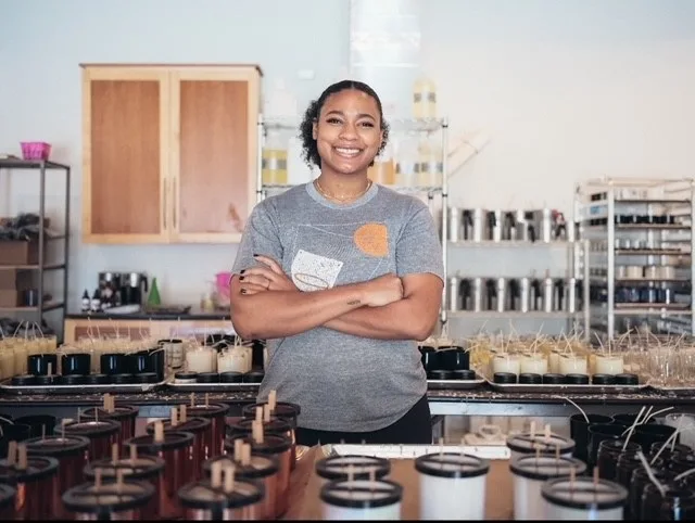 Andrea of Pretty Honest Candles in her studio.