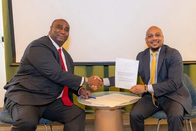 [Left-Right: Derrick Brent, Deputy Under Secretary of Commerce for Intellectual Property and Deputy Director of the United States Patent and Trademark Office and Dr. Kenneth L. Harris, President/CEO, The National Business League. Photo Credit  - Michael Cleveland/USPTO]