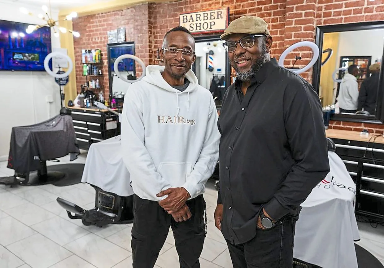 Brothers Rodney and Marichal (right), owners of HAIRitage Salon in Sacramento, are part of a growing national network of Black barbers and stylists who have become frontline mental health advocates in their communities.