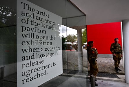 Italian soldiers stand guard in front of Israel’s pavilion at the Venice Biennale.